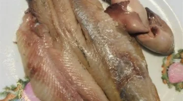 خطوات عملية تضمن نظافة الفسيخ والرنجة وتجهيز سفرة العيد بسلامة تامة